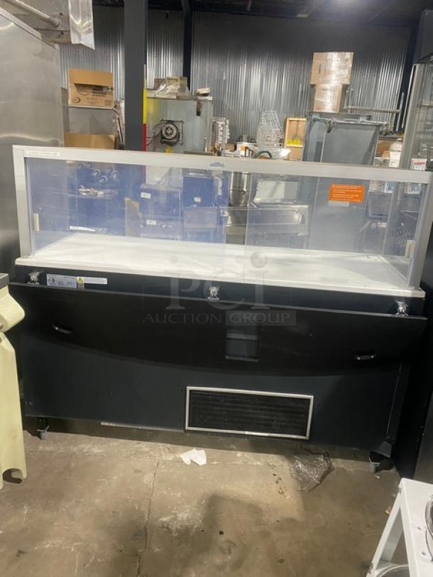 Structural Concepts SBZ6652DR refrigerated display case, black, with glass showcase, rear sliding doors, on legs, 220V 1 Phase.