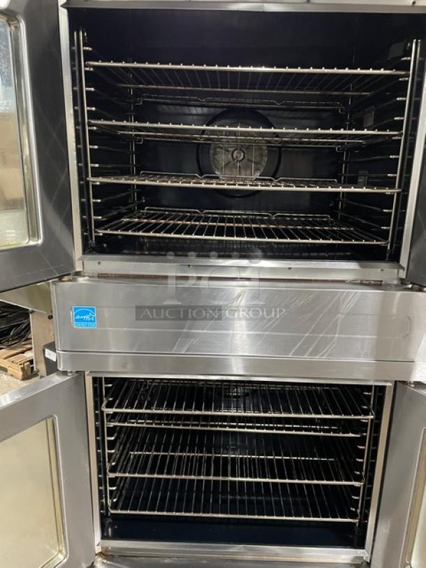 Blodgett stainless steel double stacked convection oven, Energy Star certified, with thermostatic control and wired racks, on legs.