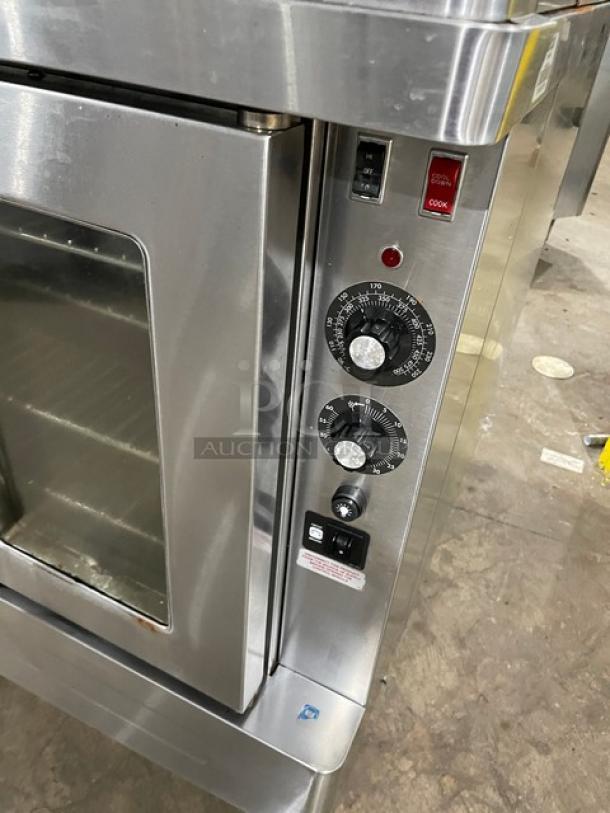 Blodgett double stacked convection oven, stainless steel, thermostatic control, wired rack, Energy Star certified, on legs.