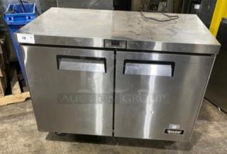 Bison BUR48 stainless steel 2-door undercounter worktop refrigerator on casters, 115V. Visible Bison logo and sturdy construction.