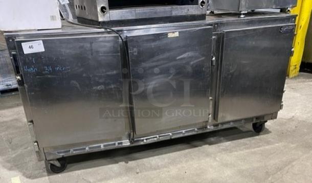 Beverage-Air 3-door stainless steel undercounter refrigerator, model UCR72A, with wired rack and casters, 115V, in used condition.