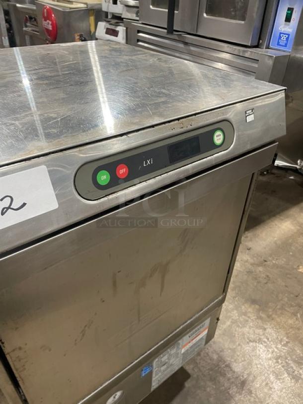 Hobart LXI Series commercial stainless steel undercounter dishwasher, Energy Star certified, on legs, with controls visible.