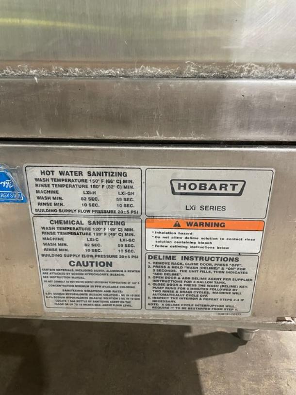 Hobart LXI Series stainless steel undercounter dishwasher, Energy Star certified, with sanitizing instructions and warning label visible.