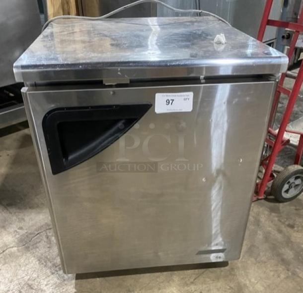 True TUF-28SD stainless steel undercounter worktop freezer, single door, poly-coated wire rack, on casters, commercial use.