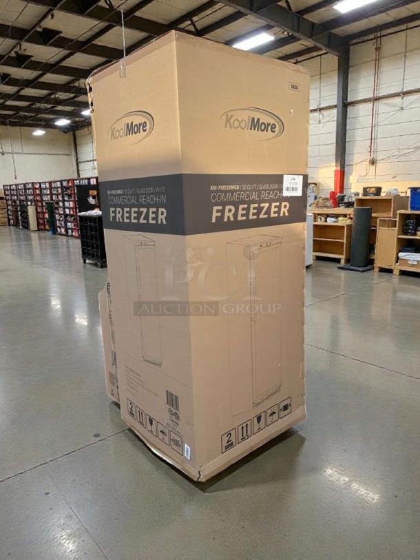 Brand new Koolmore KM-FMD20WGD commercial reach-in freezer in original packaging. Scratch & dent condition.