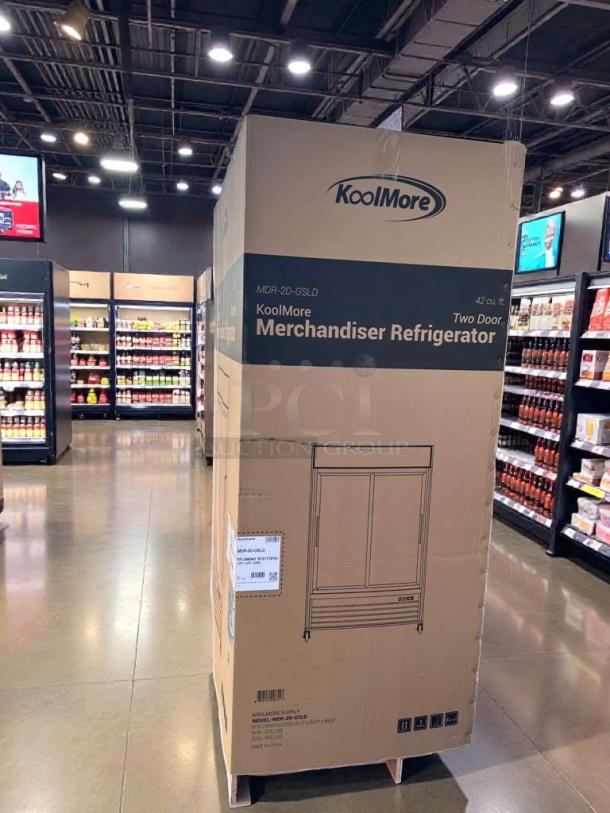 Koolmore 53" two-door glass merchandiser refrigerator in box, model MDR-2D-GSLD. Brand new, scratch & dent condition.