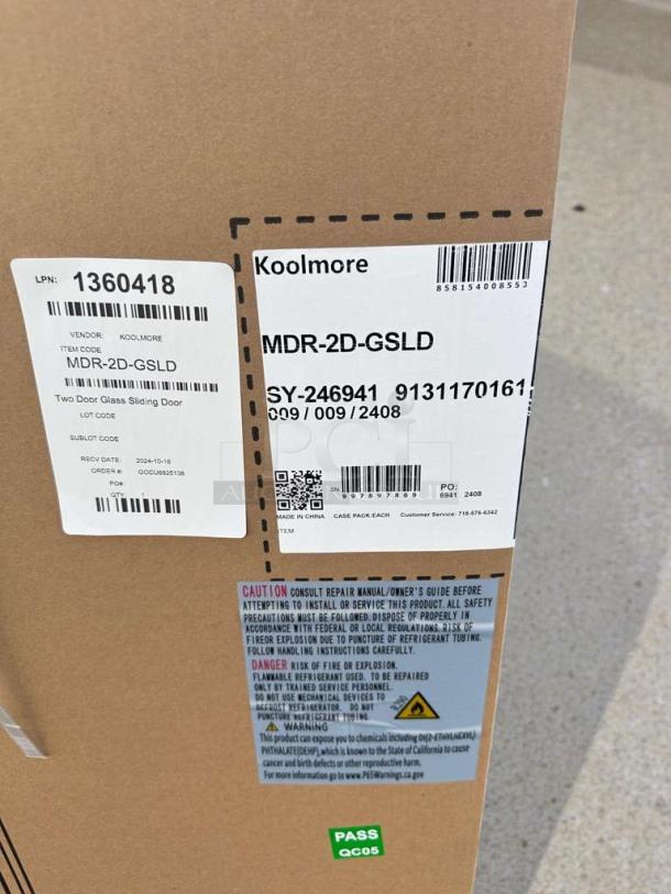 Koolmore 53" Two-Door Glass Merchandiser Refrigerator, Model MDR-2D-GSLD, brand new, scratch & dent, labels on packaging.