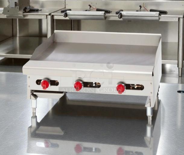 Brand new American Range 36" thermostatic gas griddle, model ARTG-36-24. Scratch & dent, excellent condition, red knobs.