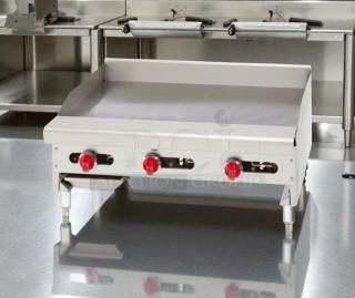 Brand new American Range 36" thermostatic gas griddle, model ARTG-36-24. Scratch & dent, excellent condition, red knobs.