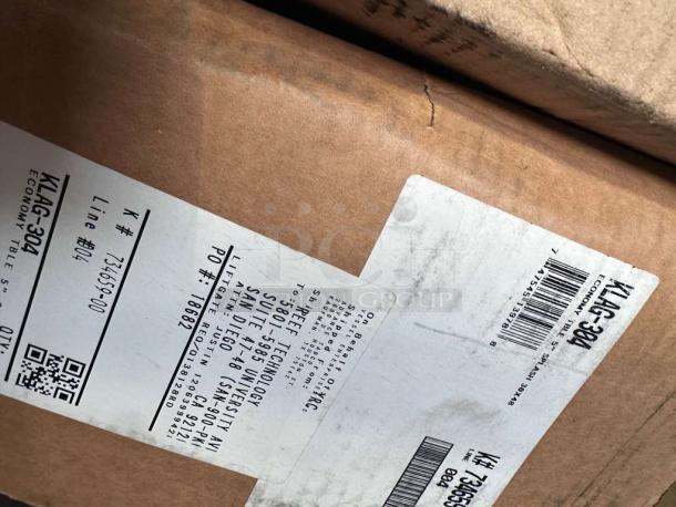 Box label for Advance Tabco Work Table, Model KLAG-304-X, brand new, with shipping details and barcodes visible.