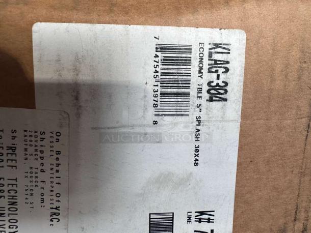 Advance Tabco stainless steel work table box label, model KLAG-304-X, 30x48 inches, economy table with 5" splash.