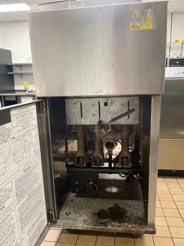 Frymaster commercial gas fryer, floor model, natural gas, outstanding condition, fully tested, visible internal components.