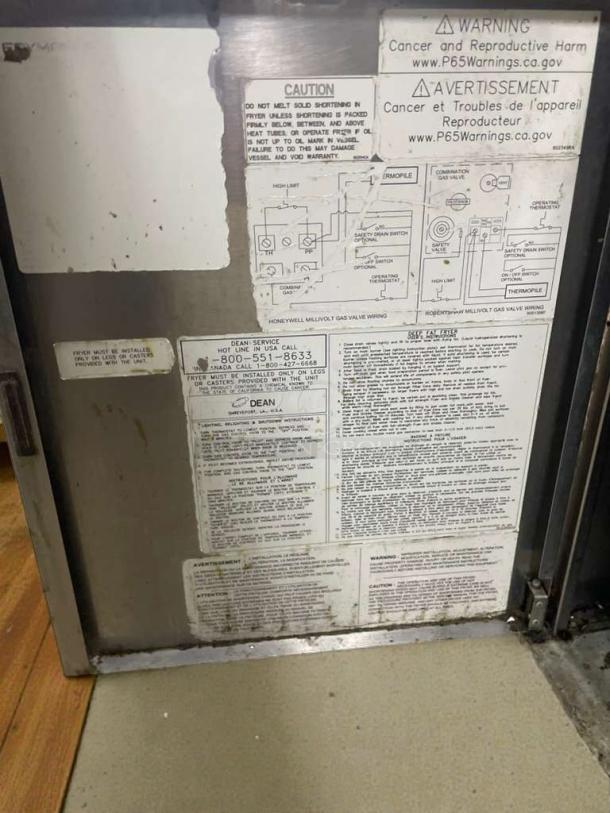 Frymaster commercial gas fryer in outstanding condition. Floor model, natural gas, fully tested. Warning and instruction labels visible.