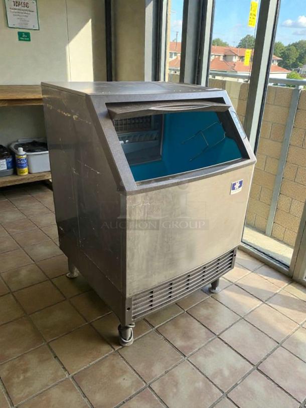 Manitowoc UDF0140A-161B undercounter ice maker in immaculate condition, stainless steel finish, 115V, fully tested.