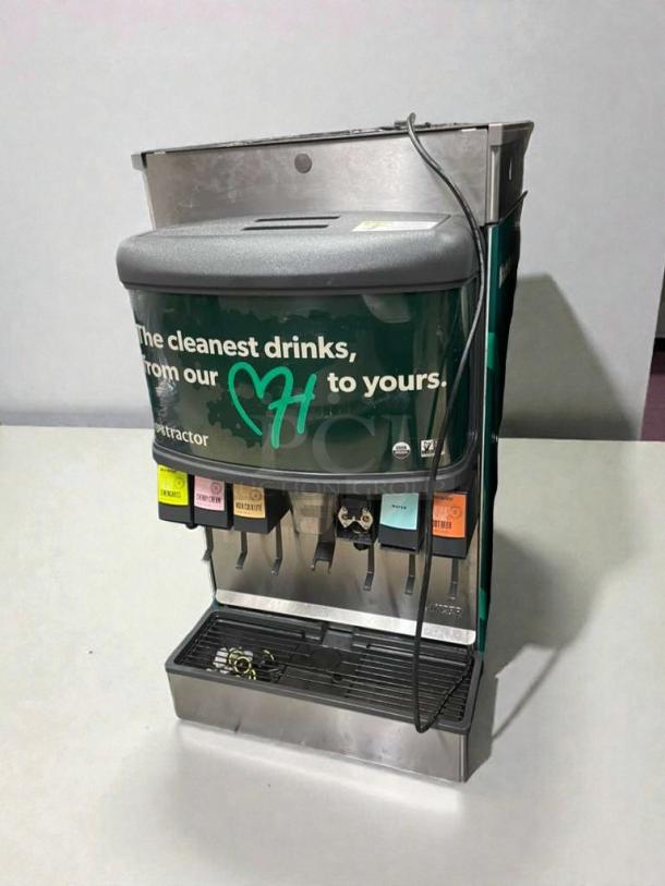 Flawless Tractor Beverage juice dispenser, model TRC-M-JCE-0023, multi-flavor, 115V/single phase, excellent condition.