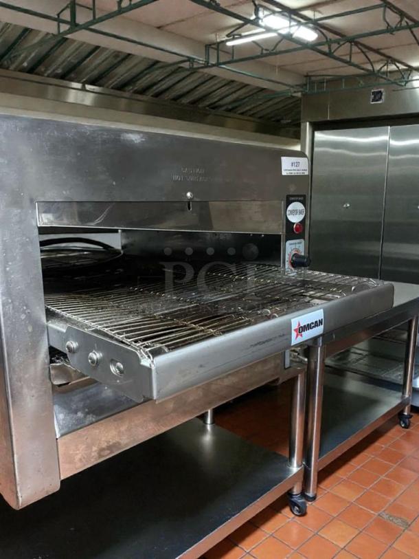 Flawless Omcan conveyor toaster, model CE-CN-1800, 120V single-phase, fully tested and working, stainless steel.
