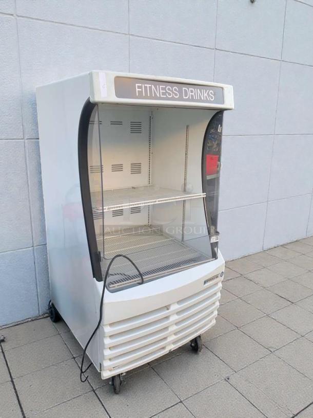 Beverage-Air Open Merchandiser BZ13-1-W, excellent condition, 115V, single phase, glass front, "Fitness Drinks" label.