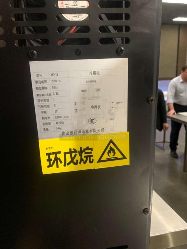 Commercial countertop mini refrigerator, model MC-18, 220V, commercial grade. High-grade condition, fully tested. Warning label visible.