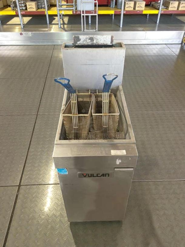Vulcan Hart gas floor fryer, premium condition, model VUL-L-FRY-0089. Features include dual baskets, natural gas, fully tested.