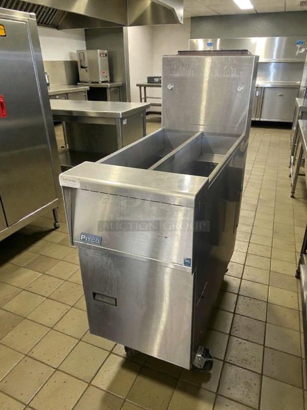 Pitco SG14T commercial gas fryer in like-new condition, natural gas. Features include stainless steel body and dual fry tanks.