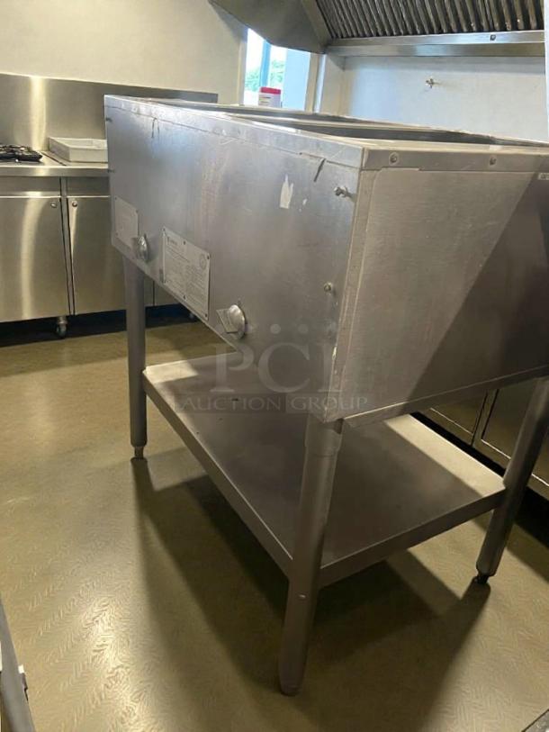 Eagle Waterless Hot Food Table, 2-well, manual controls, excellent condition, fully tested. Metal Masters USA. Model EAG-L-HOT-0096.
