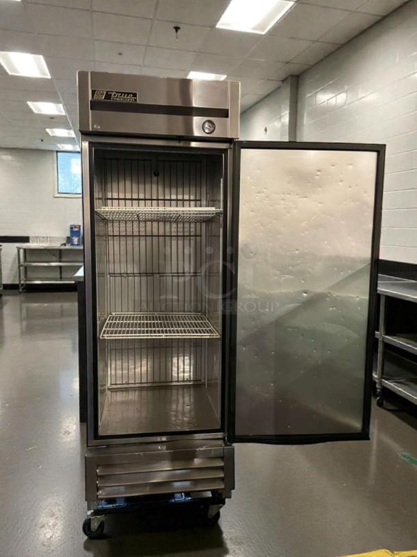 True T-23F commercial reach-in freezer, high-grade condition, single phase, fully tested, open door, interior shelves visible.