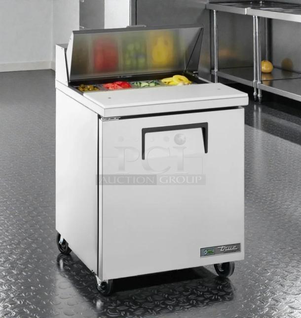 True TSSU-27-08-HC prep table in exceptional condition, stainless steel, with top pan storage, 115V, fully tested and working.