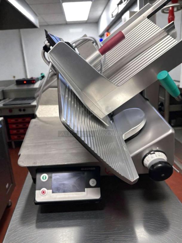 Bizerba GSP HD IW-90 GCB semi-automatic meat slicer in exceptional condition, fully tested, with digital controls and sharp blade.
