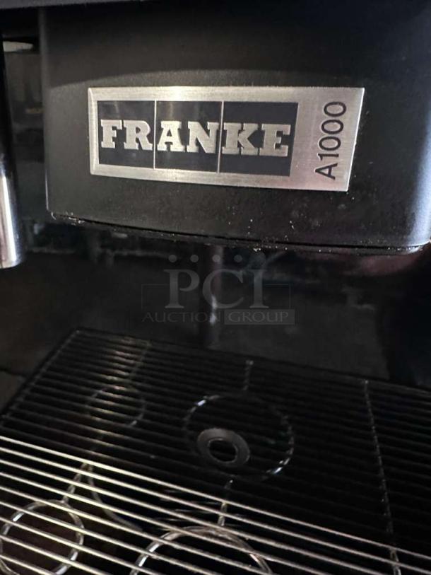 Franke A1000 Espresso Machine, outstanding condition, fully tested, commercial self-serve model. Brand logo and model visible.