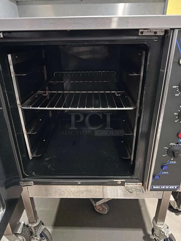 Moffat Turbofan E32MS electric convection oven in superior condition, 208V/single phase, on stand with caster wheels, tested and working.