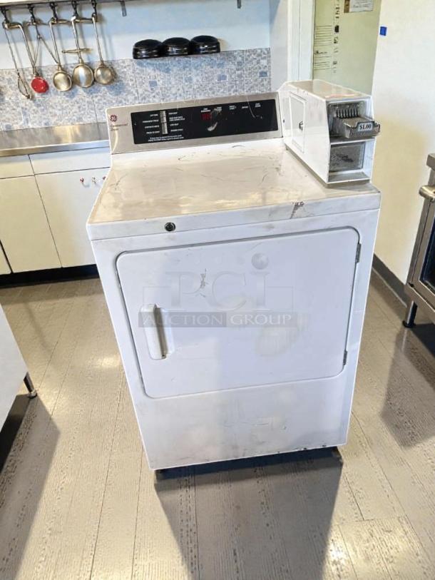 Immaculate GE coin-operated dryer, model DCCD330ED2WC, 120/208-240V. Fully tested, pristine condition, with coin slot.