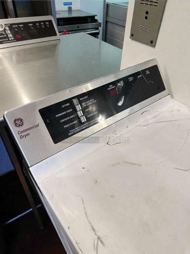 Immaculate GE commercial coin-operated dryer, model DCCD330ED2WC, 120/208–240V, fully tested, working, control panel visible.