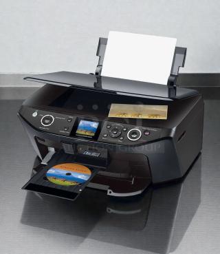 Epson Stylus Photo RX595 Inkjet Printer, all-in-one, pristine condition, tested and working, prints photos and CDs.