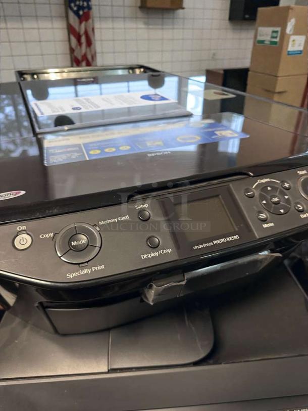 Epson Stylus Photo RX595 all-in-one inkjet printer in pristine condition, featuring control panel and display, model EPS-L-PRN-0132.