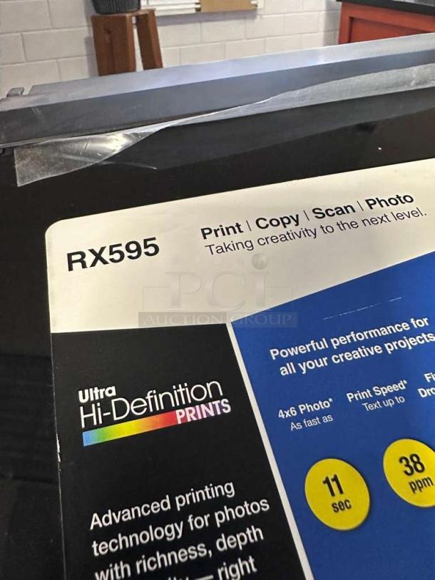 Epson Stylus Photo RX595 All-In-One Inkjet Printer in pristine condition. Features high-definition prints, tested and working.