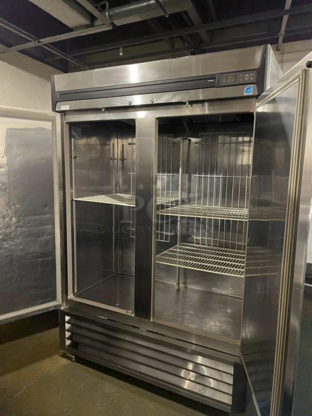 True R49-S Commercial Reach-In Refrigerator, immaculate condition, fully tested, stainless steel, dual glass doors, wire shelving.