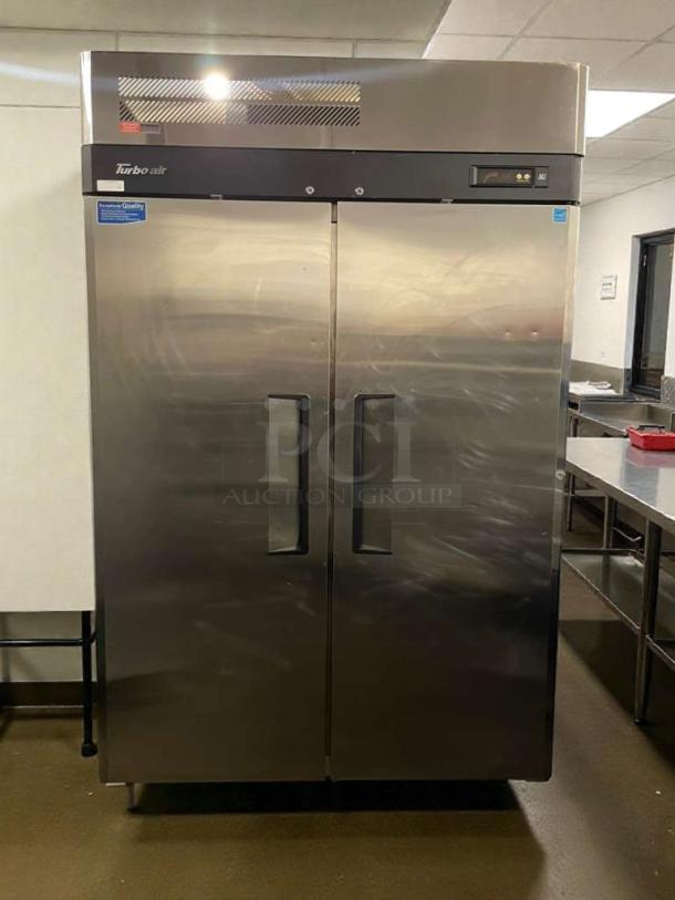 Turbo Air M3F47-2 commercial reach-in freezer in excellent condition, stainless steel, 115V, fully tested, dual doors.