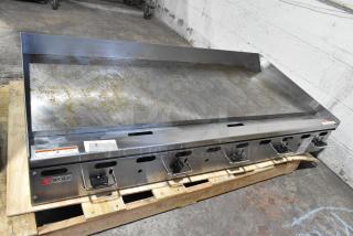 BRAND NEW SCRATCH AND DENT Wolf AGM60-101 stainless steel 60" commercial griddle with manual controls, 135,000 BTU.