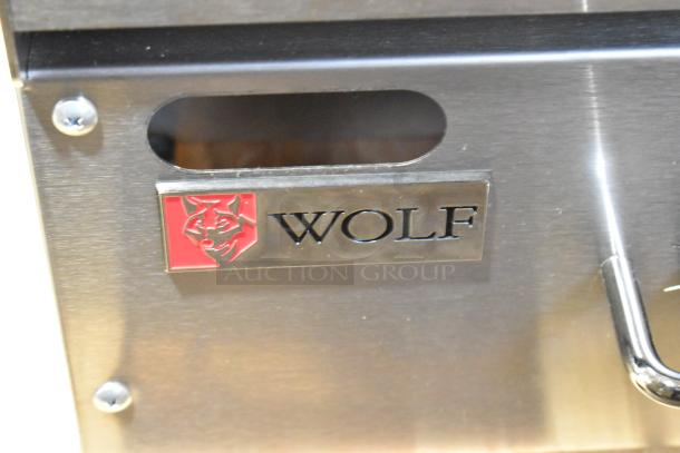 Wolf by Vulcan AGM60-101 stainless steel commercial griddle. New, scratch and dent. Manual controls. 60" wide, 135,000 BTU.
