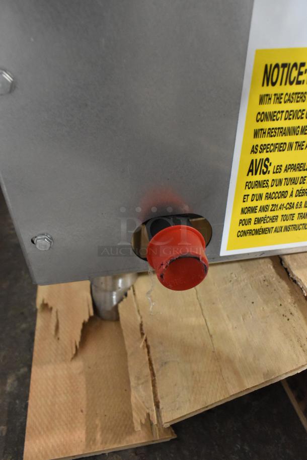 BRAND NEW Scratch and Dent Wolf AGM60-101 Stainless Steel Gas Griddle, 135,000 BTU, with manual controls visible.