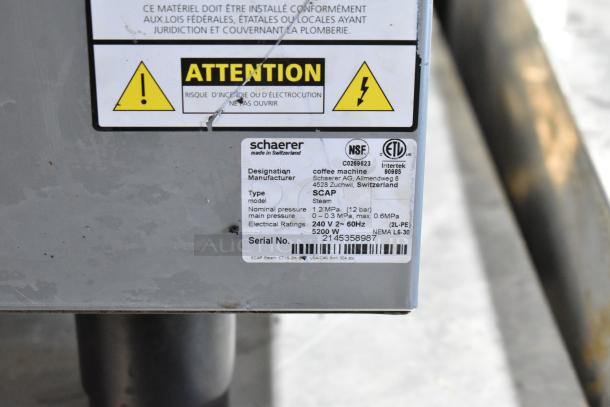 Schaerer SCAP Coffee Art Metal Commercial Coffee Machine with 2 hoppers, 240V. Features NSF and ETL certifications. Serial No. 2145358987.