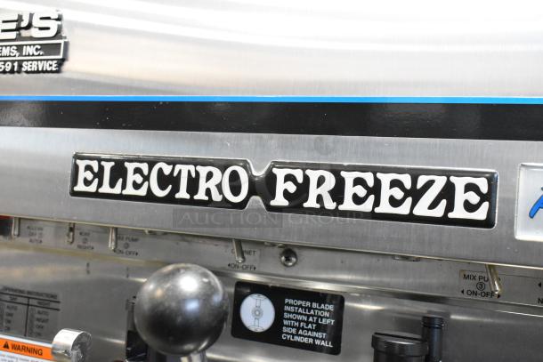 Electro Freeze 4000EP-132 stainless steel soft serve machine, 2-flavor with twist, commercial casters, water-cooled, 208-230V, 3-phase.