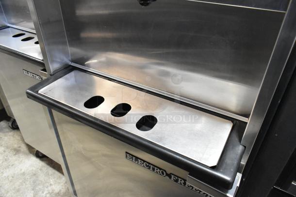 Electro Freeze 4000EP-132 stainless steel soft serve ice cream machine, 2 flavor with twist, on commercial casters.