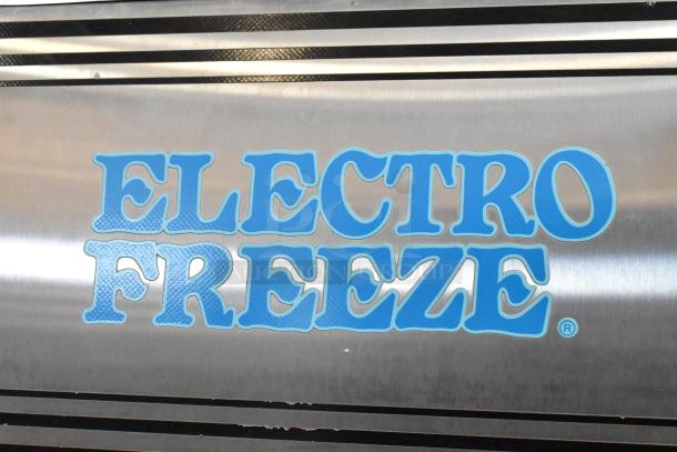 Electro Freeze soft serve machine, model 99T-RMT-137, stainless steel, 2 flavor twist, water-cooled, on casters.