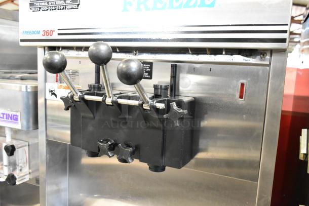 Electro Freeze 99T-RMT-137 soft serve machine, stainless steel, 2-flavor with twist, commercial casters, water-cooled.