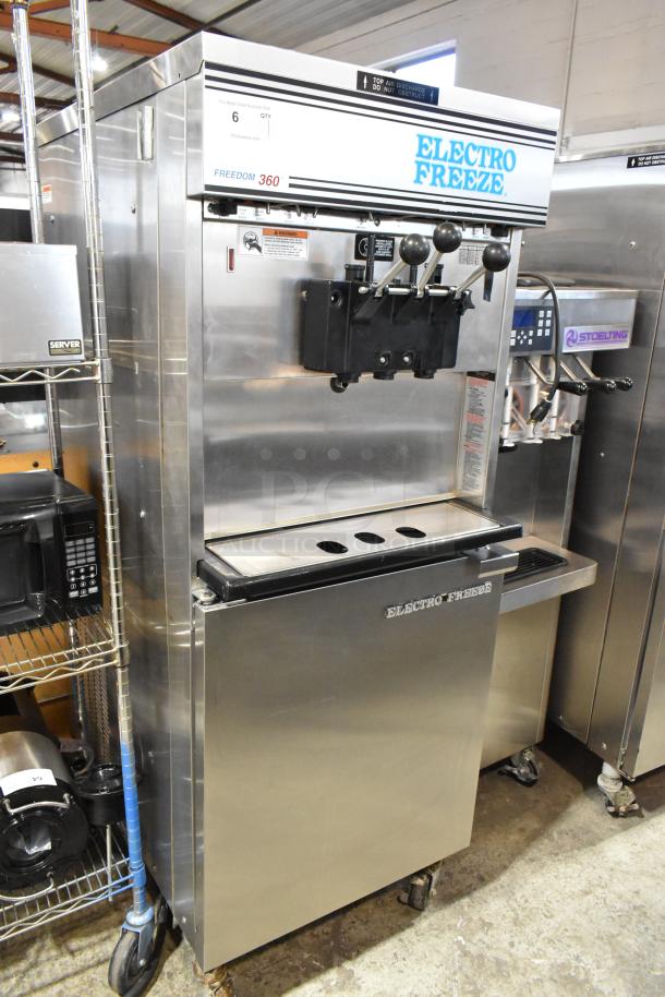 Electro Freeze 30T-CMT-132 stainless steel soft serve machine, water-cooled, dual flavor with twist, on commercial casters.