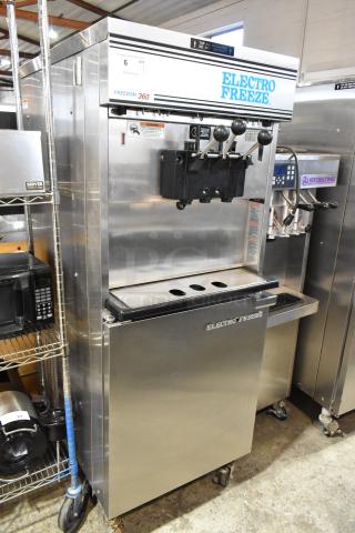 Electro Freeze 30T-CMT-132 stainless steel soft serve machine, water-cooled, dual flavor with twist, on commercial casters.