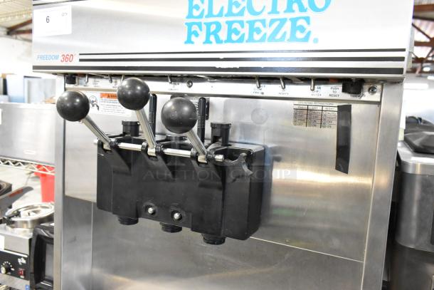 Electro Freeze 30T-CMT-132 stainless steel soft serve machine, 2 flavor w/ twist, water cooled, on casters, 208-230V, 3 phase.