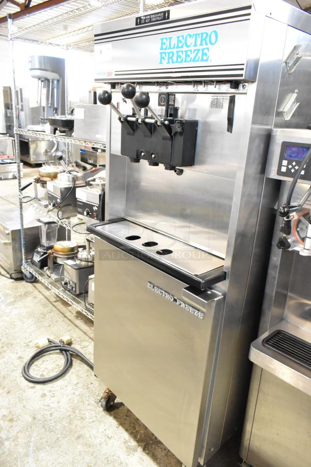 Electro Freeze 30T-CMT-132 stainless steel soft serve ice cream machine, 2 flavors with twist, on casters, water-cooled.