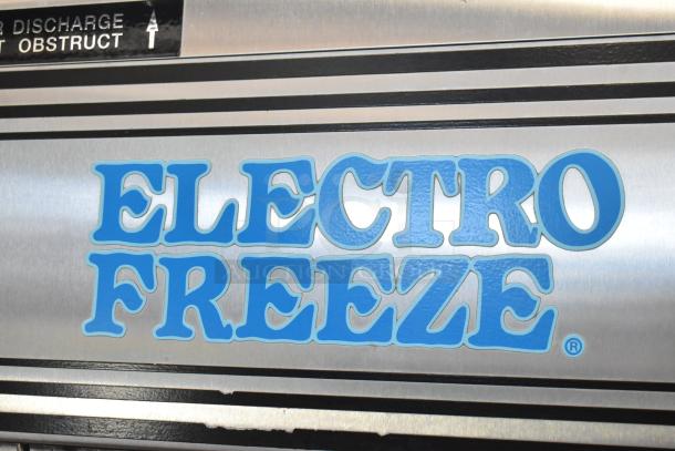 Electro Freeze 30T-CMT-132 stainless steel soft serve ice cream machine, 2-flavor with twist, commercial casters.